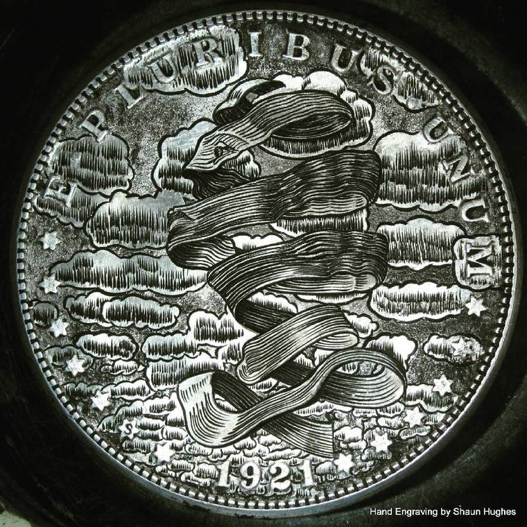 Monedas talladas por Shaun Hughes